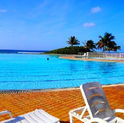 Anse des Rochers, studio vue mer 180° et pieds dans l'eau