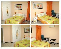 Flic en Flac, Camelia, Plage 2mins de marche , RDC Villa de 2 chambres Climatisée, Propre, Tout Confort, Piscine, Sécurité, Accueil Chaleureux, Cadre Reposant et Tranquille. Meilleure Prix. A voir Absolument