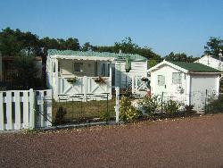 Location mobil-home 4/6 pers. - Camping ** les Ombrages avec piscine - Ronce-Les-bains