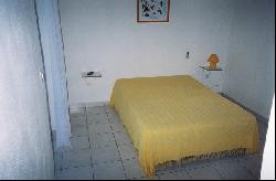 GUADELOUPE Saint- François Bungalows dans jardin créole